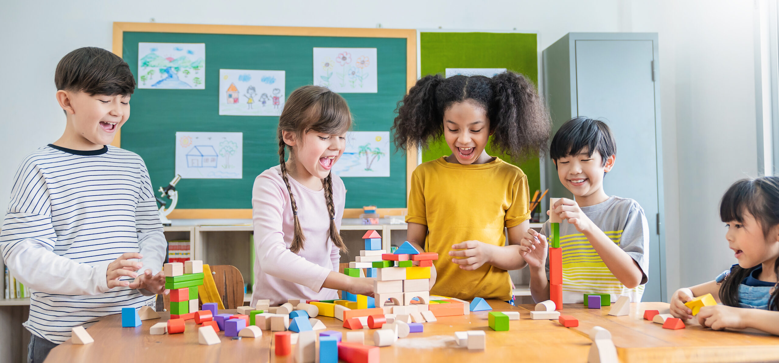 children playing in classroom